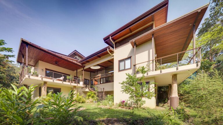 Open balcony in a Costa Rican jungle home with views of the surrounding tropical landscape.